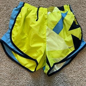 Nike athletic shorts with geometric pattern and panty liner